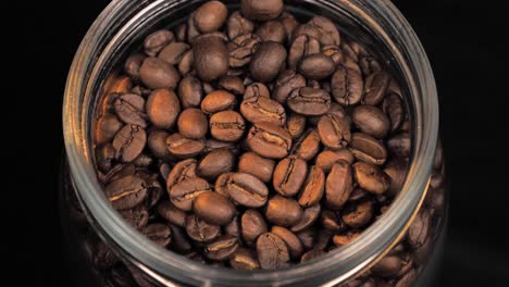 Open-a-jar-full-of-Coffee-Beans-in-slow-motion,-UHD