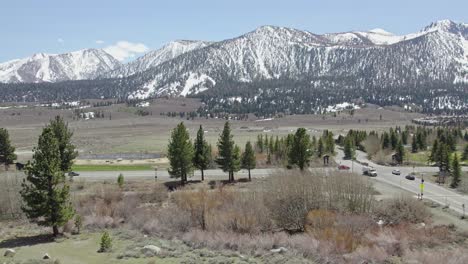 4k-drone-footage-of-Mammoth-Lakes-in-early-Spring-looking-out-towards-the-snow-capped-Eastern-Sierra