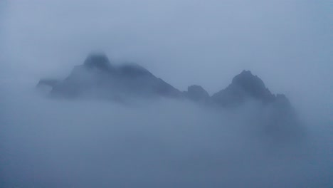 Eystrahorn-Mountain-Appears-Behind-The-Thick-Clouds-And-Fog-In-East-Iceland