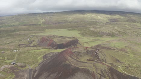 Aerial-View-Of-Grabrok-Mountain,-Volcanic-Crater-At-Daytime-In-west-Iceland
