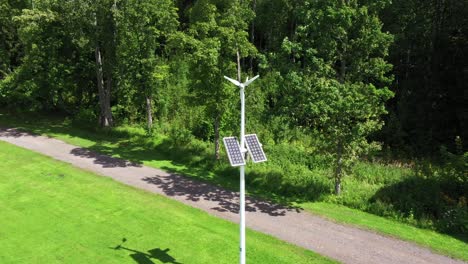 Small-wind-turbine-generator-on-street-light-with-solar-panels