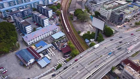 Drone-shots-of-Kuala-Lumpur-city-traffic-and-streets,-Malaysia,-UHD-1