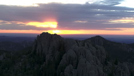 Cathedral-Spires-granite-rock-peaks-during-sunset,-aerial