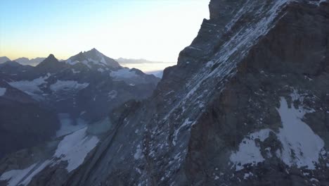 Drone-descending-along-Lion-Ridge-approach-from-Italy-to-peak-of-The-Matterhorn