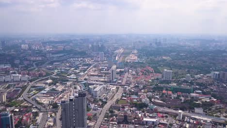 Drone-shots-of-Kuala-Lumpur-skyline-with-skyscrapers,-Malaysia,-UHD-5