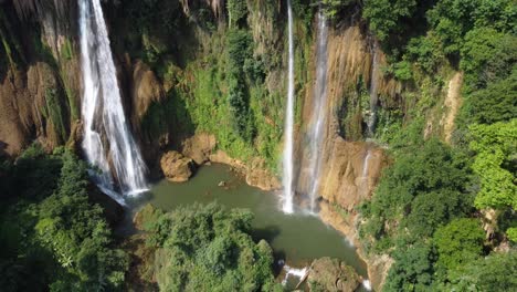 A-stunning-drone-shot-of-the-tropical-Thi-Lo-Su-Waterfall-located-off-the-beaten-track-in-the-backpackers-paradise-of-North-Thailand-in-the-area-of-Umphang-in-Southeast-Asia