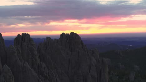 Aerial,-the-Cathedral-Spires-in-Custer-State-Park,-South-Dakota-during-sunset