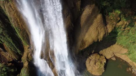A-nice-close-up-drone-shot-of-the-waterfalls-of-Thi-Lo-Su-Waterfall,-located-off-the-beaten-track-in-the-backpacker's-paradise-of-North-Thailand-in-the-area-of-Umphang-in-Asia