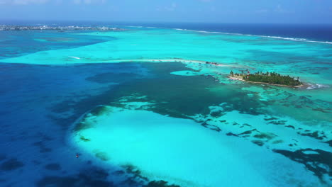 Drone-footage-flying-over-the-blue-water-and-reef-of-San-Andres-Island-in-Colombia