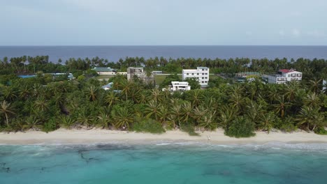 Vacation-tropical-paradise-with-hotels-on-Dhigurah-Island,-Maldives,-aerial-view