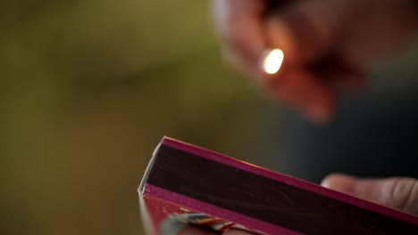 Lighting-up-wooden-matchsticks-closely-for-smoking