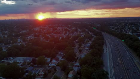A-high-angle,-timelapse-over-a-residential-neighborhood-on-Long-Island,-NY-by-the-parkway