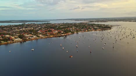 Sunset,-drone-shot-of-boats-on-beach-waterview-Sydney-Australia