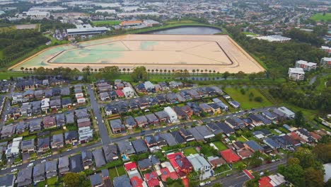 Drone-of-houses-and-floods-in-Sydney,-Australia
