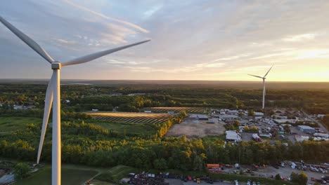 Drone-shot-of-windmills-generating-electricity-in-Rhode-Island-during-a-sunset