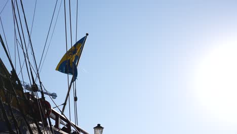 London-Canary-Wharf-Aug-2022-The-Götheborg-of-Sweden's-flag-ripples-in-the-wind