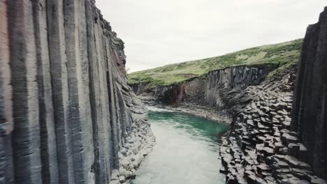 Drone-shot-flying-inside-Studlagil-canyon-in-Iceland-4k
