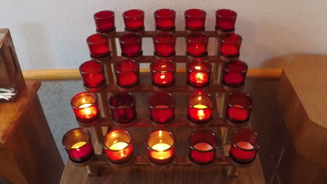 A-large-group-of-religious-votive-candles-at-a-Catholic-church