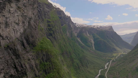 Falls-plunge-into-unbelievably-dramatic-mountain-valley,-Norway