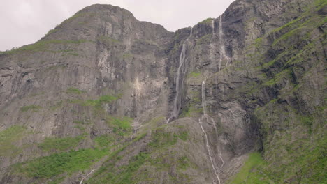 Impressive-Kjerrskredsfossen-falls-down-precipitous-mountainside;-drone