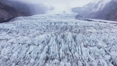 Jagged-ice-surface-of-Kvíarjökull-glacier-in-Iceland,-cloudy-day