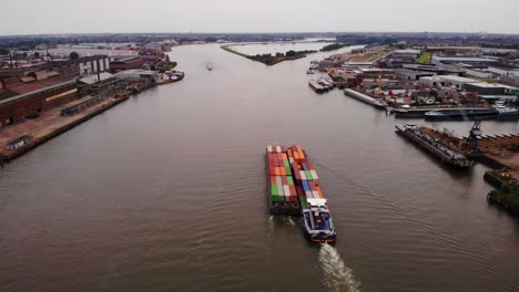 Bird's-Eye-View-Of-Two-Freight-Barge-Transporting-Intermodal-Container-By-The-Oude-Maas-River