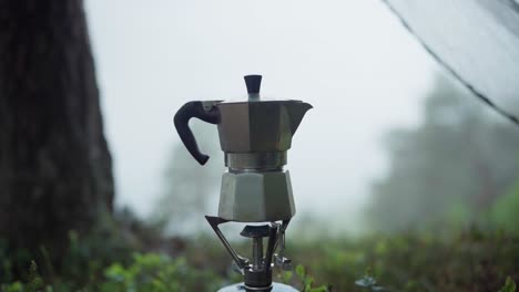 Making camping coffee from a geyser coffee maker on a gas burner, Stock  image