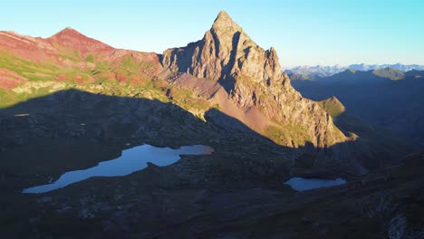 Dolly-drone-Morning-sunrise-in-Anayet-mountain-lake-range-and-peak-in-Spanish-Pyrenees-during-summer-morning