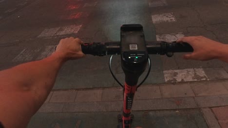 POV-sevilla-electric-scooter-mobility-early-morning-commute-waitting-crossing