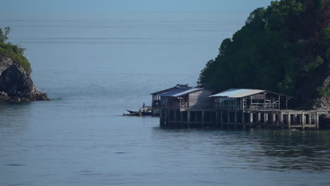 Fishing-village-floating-on-sea-at-the-age-of-mountain
