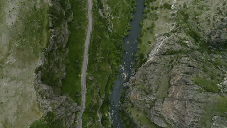 Topdown-View-Of-Mtkvari-River-Flowing-In-Steep-Gorges-Of-Tmogvi-Fortress-In-Georgia