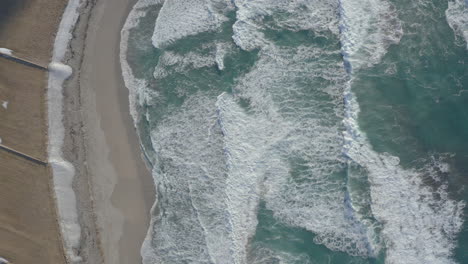 Waves-crashing-on-Unstad-beach-from-a-bird's-eye-view