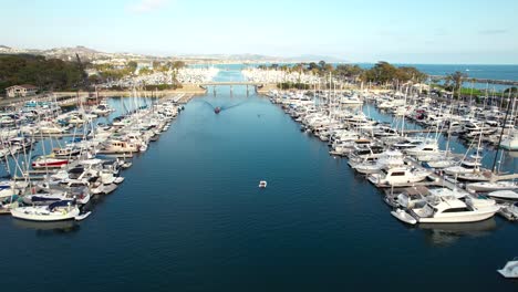 Dana-Point-marina-of-Luxury-boats-moored,-aerial-drone-view-during-the-day,-California
