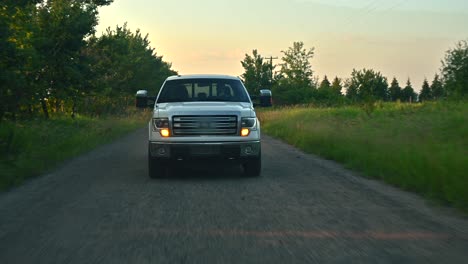 Front-view-of-Truck-Traveling-during-the-sunset