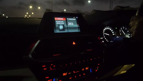 Dashboard-Of-A-Car-Driving-Through-The-Night