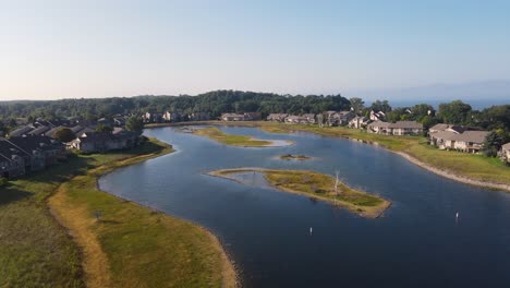 Tilting-from-bird's-Eye-view-over-the-marina-in-Muskegon's-Beachwood-neighborhood