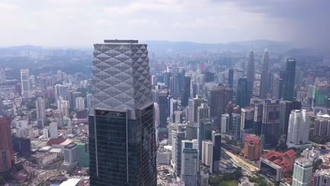 Drone-shots-of-Kuala-Lumpur-skyline-with-skyscrapers,-Malaysia,-UHD-3