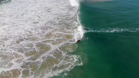 Aerial-Drone-View-of-bobyboard-having-fun-at-the-perfect-waves-in-Sintra