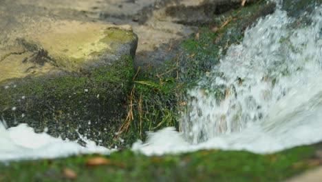 Close-up-of-a-fast-moving-stream-in-slow-motion