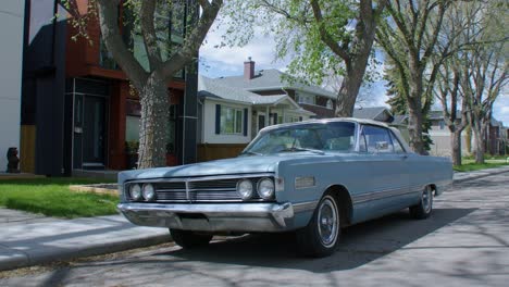 Vintage-car-blue-Mercury-parked-on-street