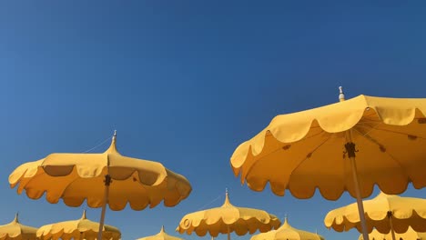 Yellow-umbrellas-and-blue-sky