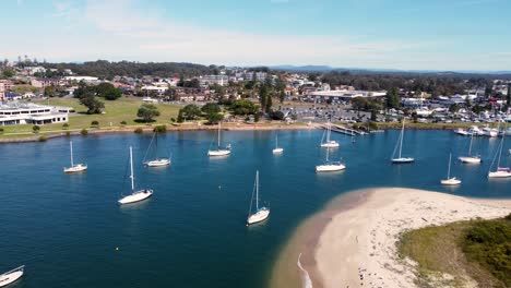 Drone-aerial-shot-of-Hastings-River-Port-Macquarie-yacht-docks-riverside-boats-NSW-Mid-North-Coast-Pacific-Ocean-Australia-4K