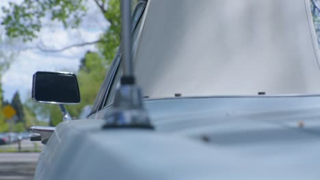 Vintage-car-blue-Mercury-side-view-mirror