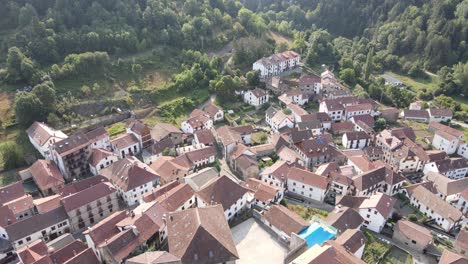Aerial-view,-drone-backing-over-Isaba,-Spain-in-Roncal-Valley-of-Pyrenees-mountains