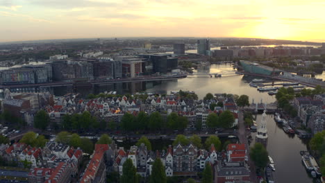 Drone-shot-over-Oosterdok-Amsterdam-at-sunrise