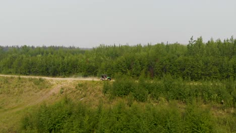 4K-Drone-Video-of-the-ATV-Driving-Around-Tanana-Lake-Recreation-Area-in-Fairbanks,-AK-during-Summer-Day-1