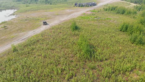 4K-Drone-Video-of-the-ATV-Driving-Around-Tanana-Lake-Recreation-Area-in-Fairbanks,-AK-during-Summer-Day-3