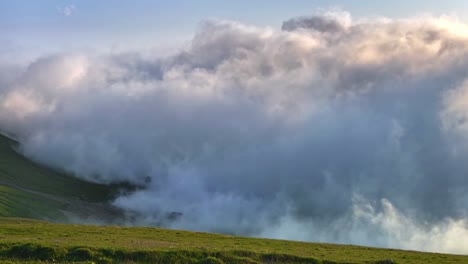 Time-Lapse-Of-Clouds-Shrouding-Mountain-Plateau-With-Village-And-Pastures,-Tkhilvana-village,-Adjara,-Georgia
