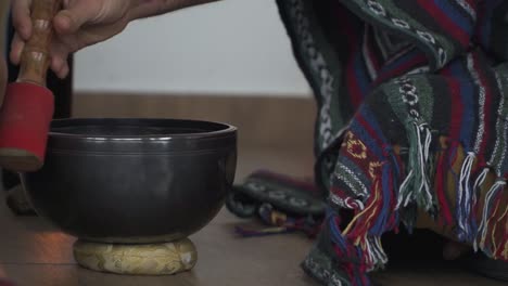 Tibetan-singing-bowl-used-to-make-sound-during-meditation-session