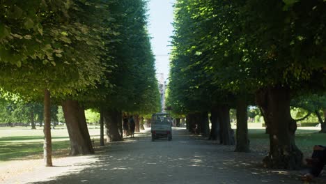 Gardener-driving-through-green-and-lush-park-called-Kongens-Have
